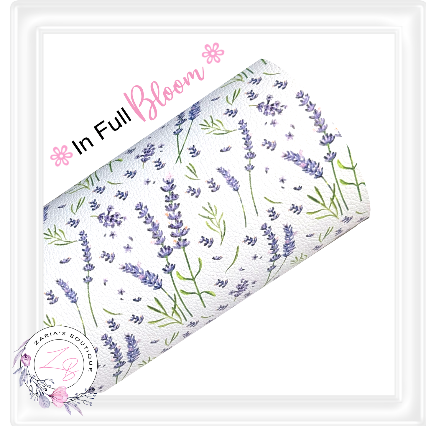A roll of white faux leather with a delicate lavender and green botanical pattern, displayed diagonally with decorative text reading 'In Full Bloom' and a Zaria’s Boutique logo.